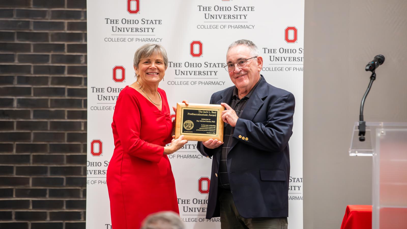Mike Snider accepting award