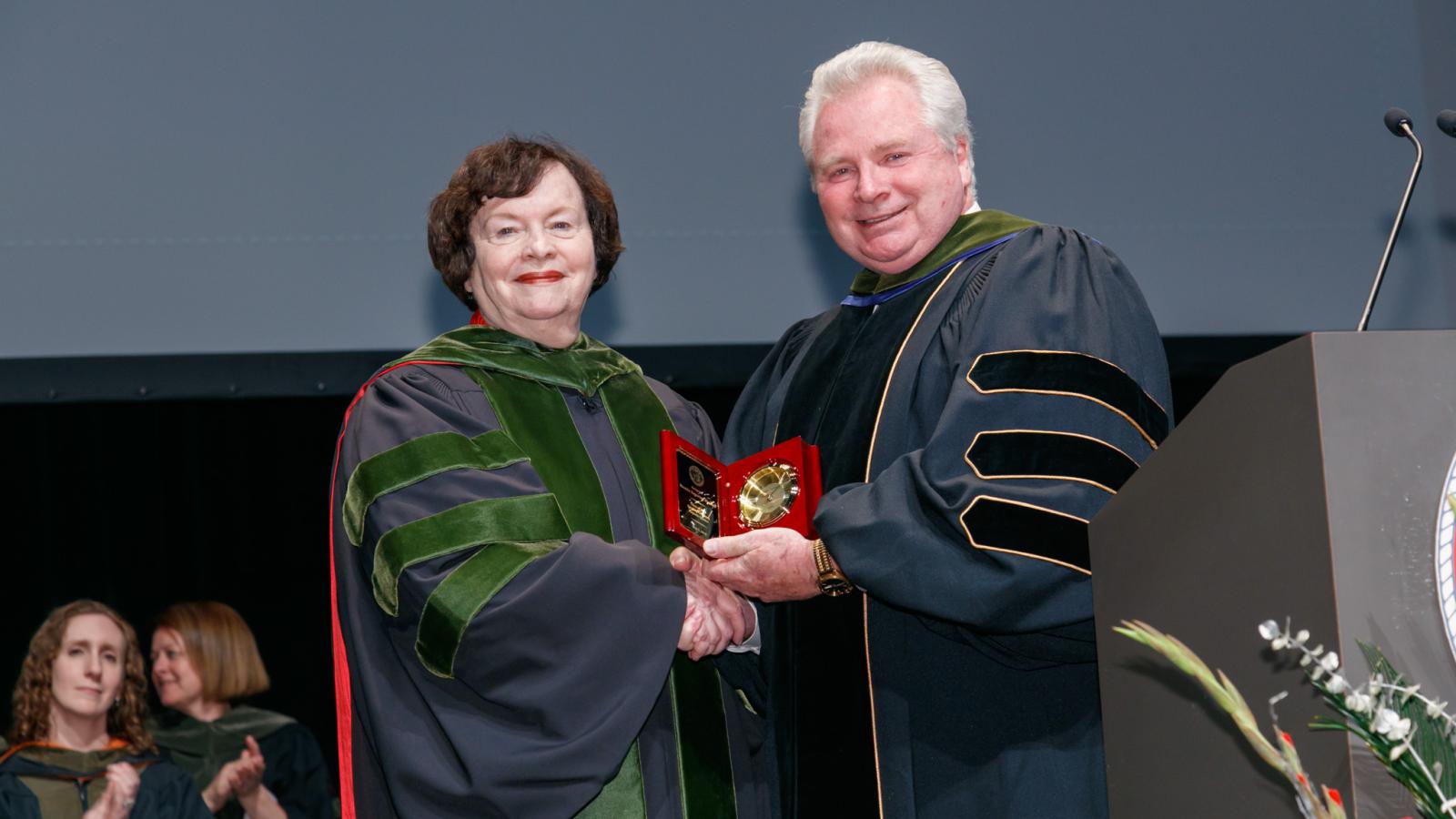 Dr. Sagraves and former dean Henry Mann, PharmD