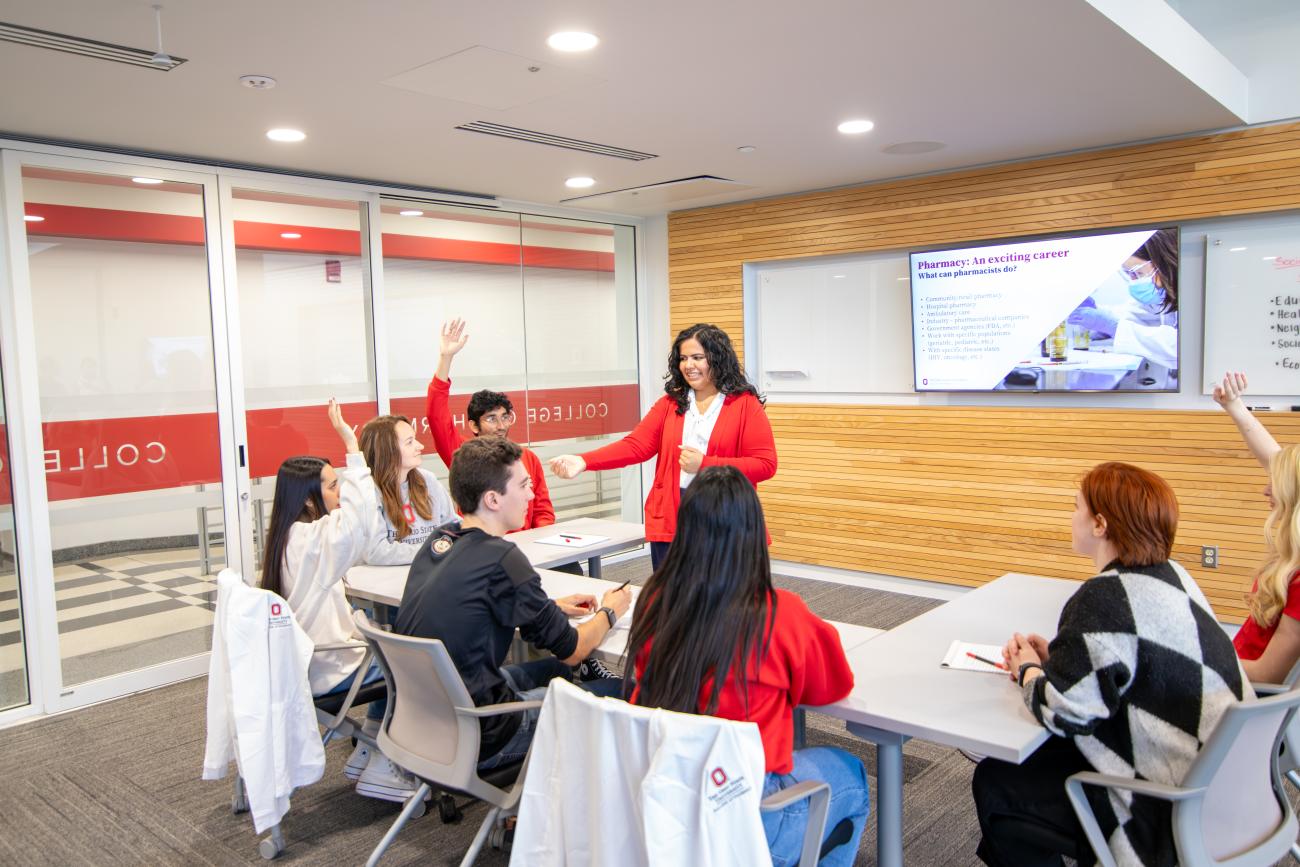 Image of professor and students having a class in the Riffe Classroom