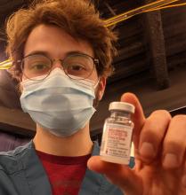 Mario Martinez with vaccine vial