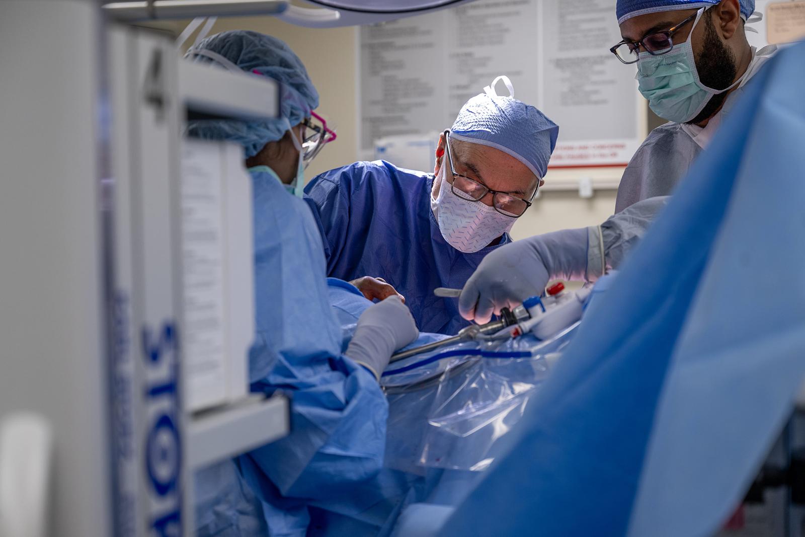 Surgeons operating