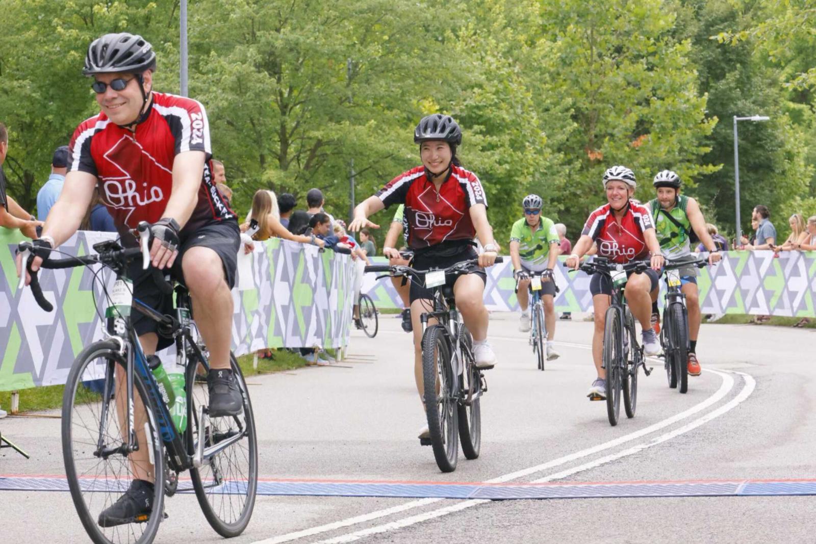 riders rounding a curve in pelotonia