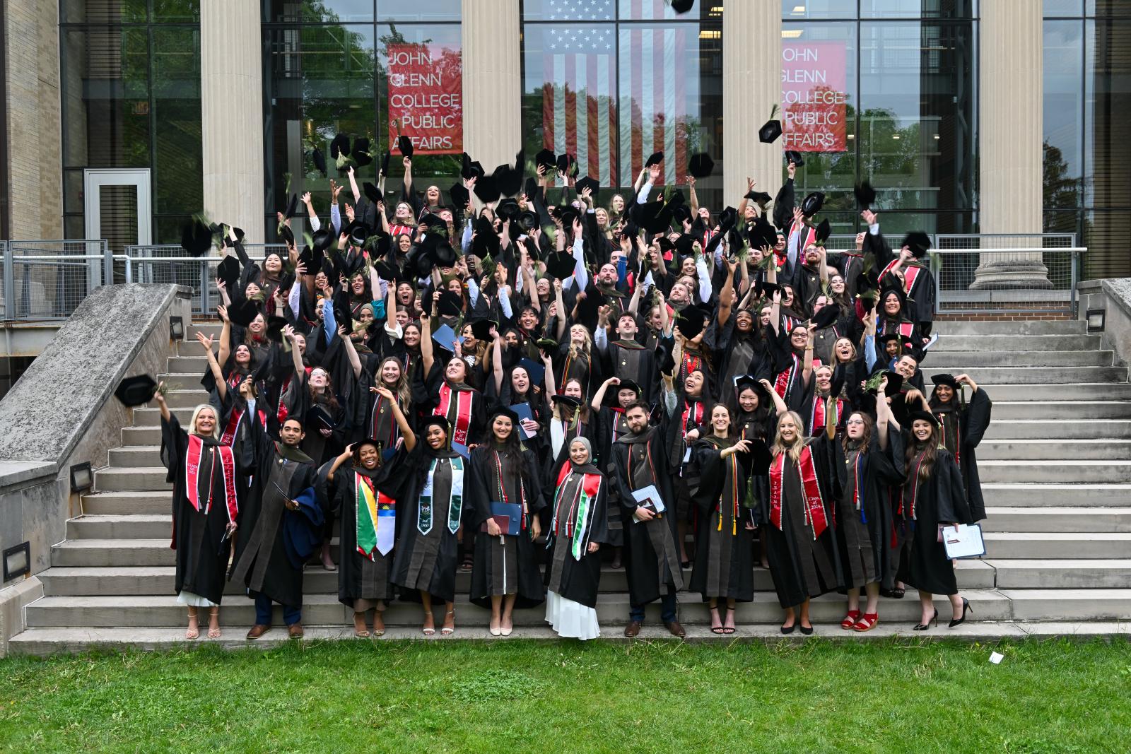 PharmDs throwing their caps at graduation