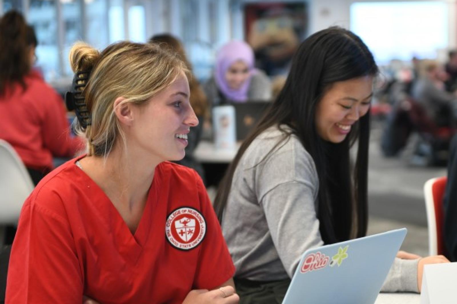 Students learning at a table