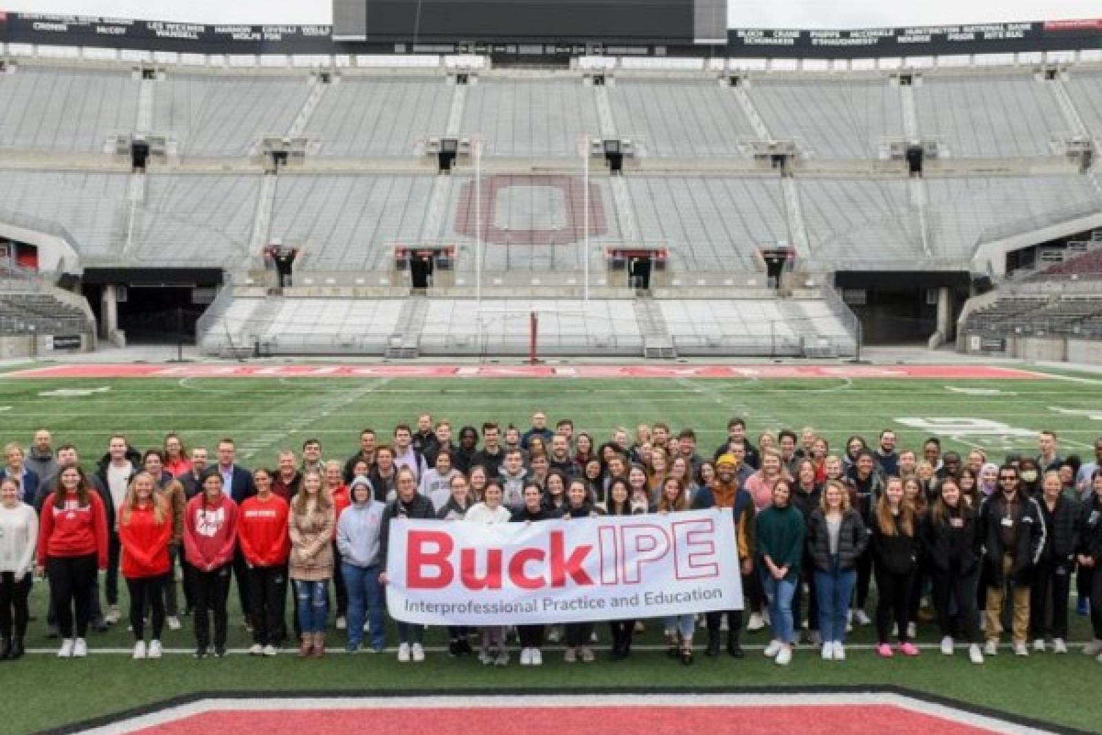 BuckIPE students gathered on the field