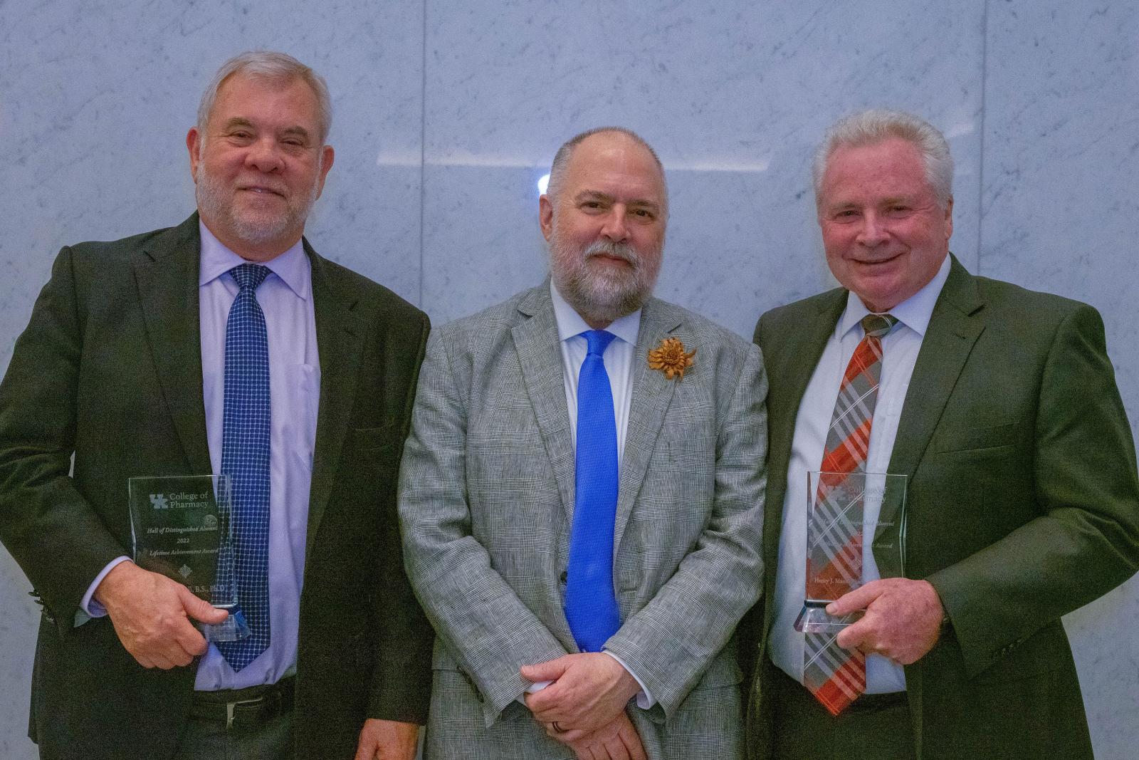 Dean Henry Mann receiving the UK College of Pharmacy's Lifetime Achievement Award