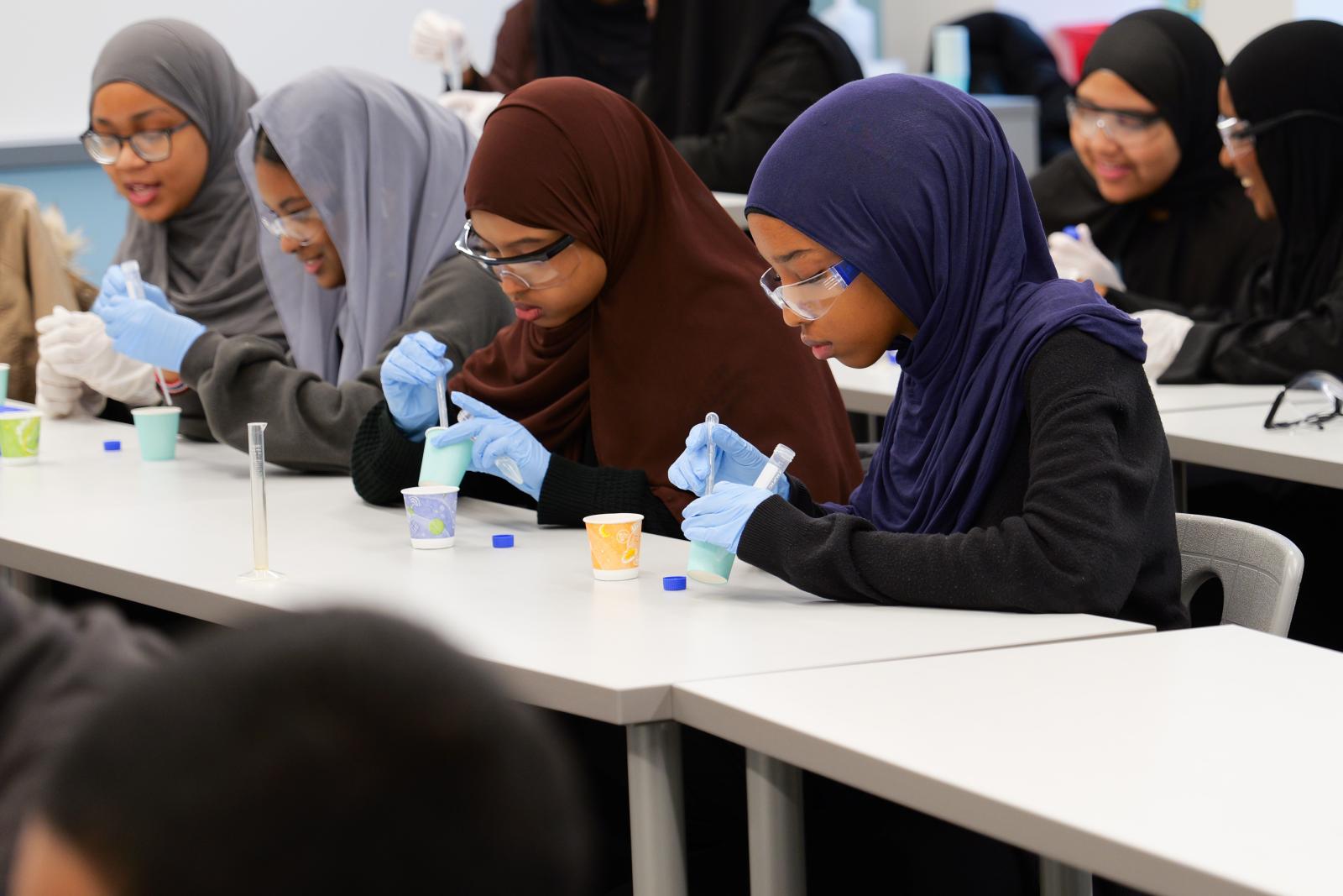 Students completing a DNA isolation lab