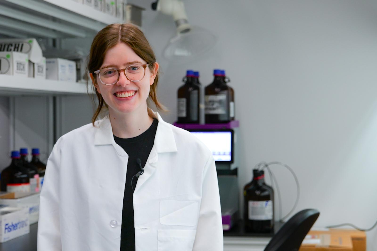Summer Powell standing in a lab space