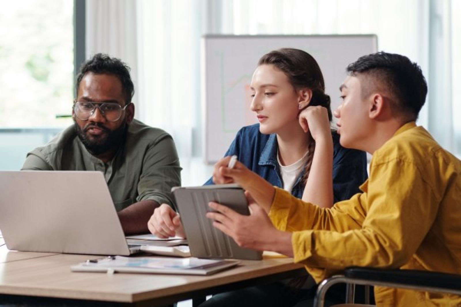 Students learning at a table