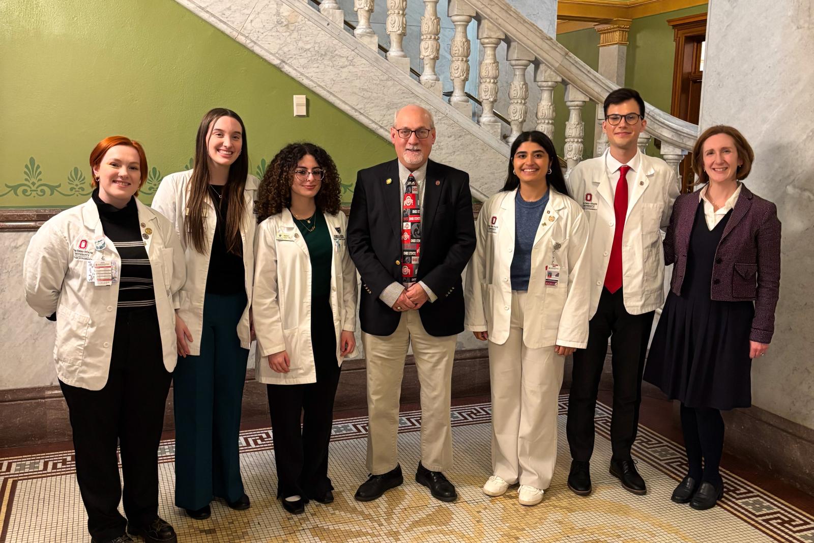 PharmD candidates and Dr. Jen Rodis pose with an Ohio congressman