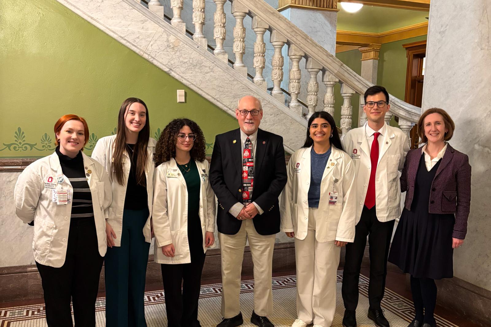 PharmD candidates and Dr. Jen Rodis pose with an Ohio congressman