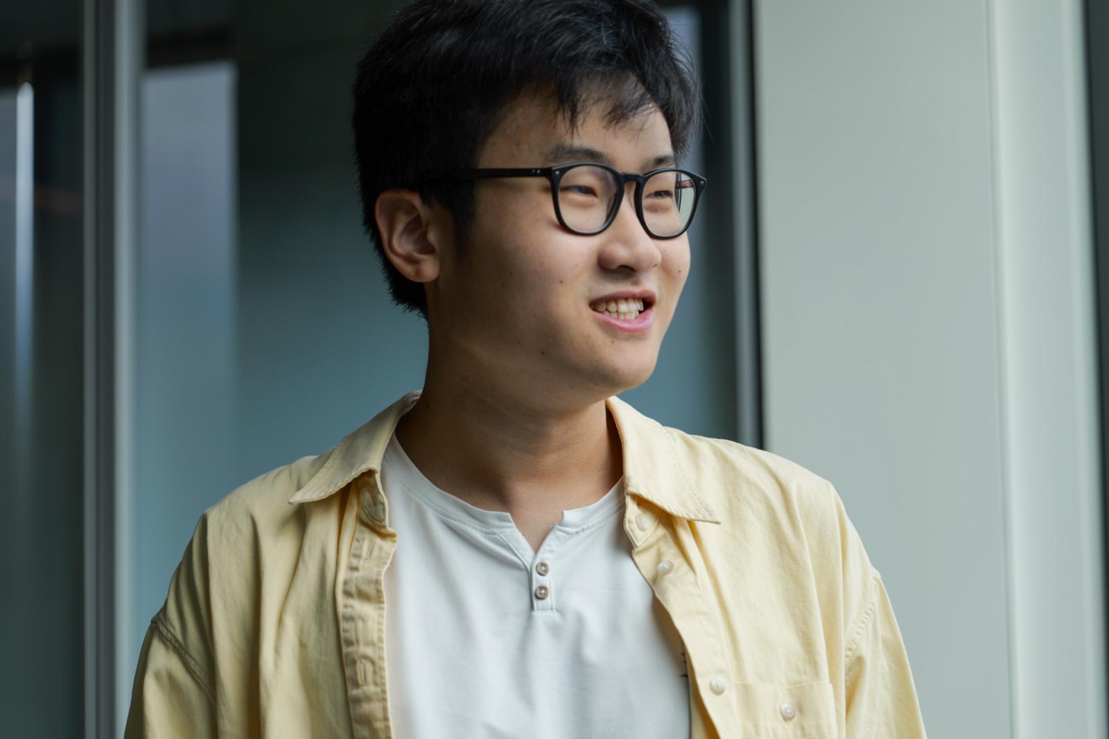 sam xing posing for photo