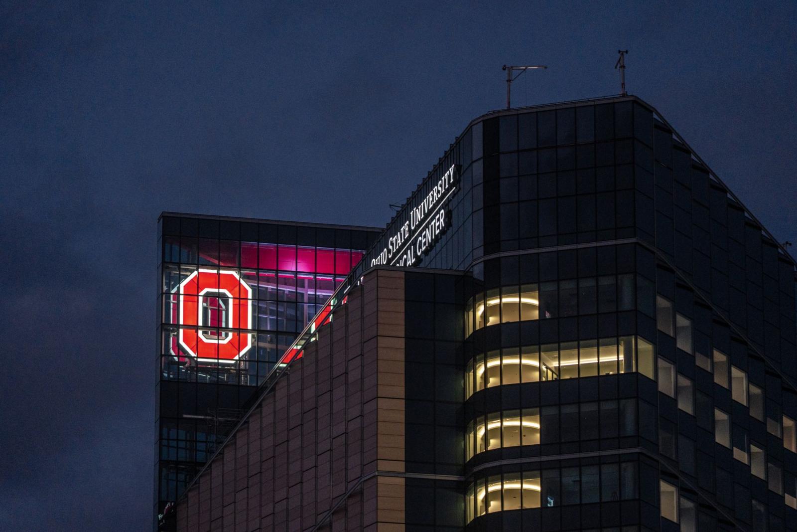 Photo of Block O lit up in the new University Hospital tower